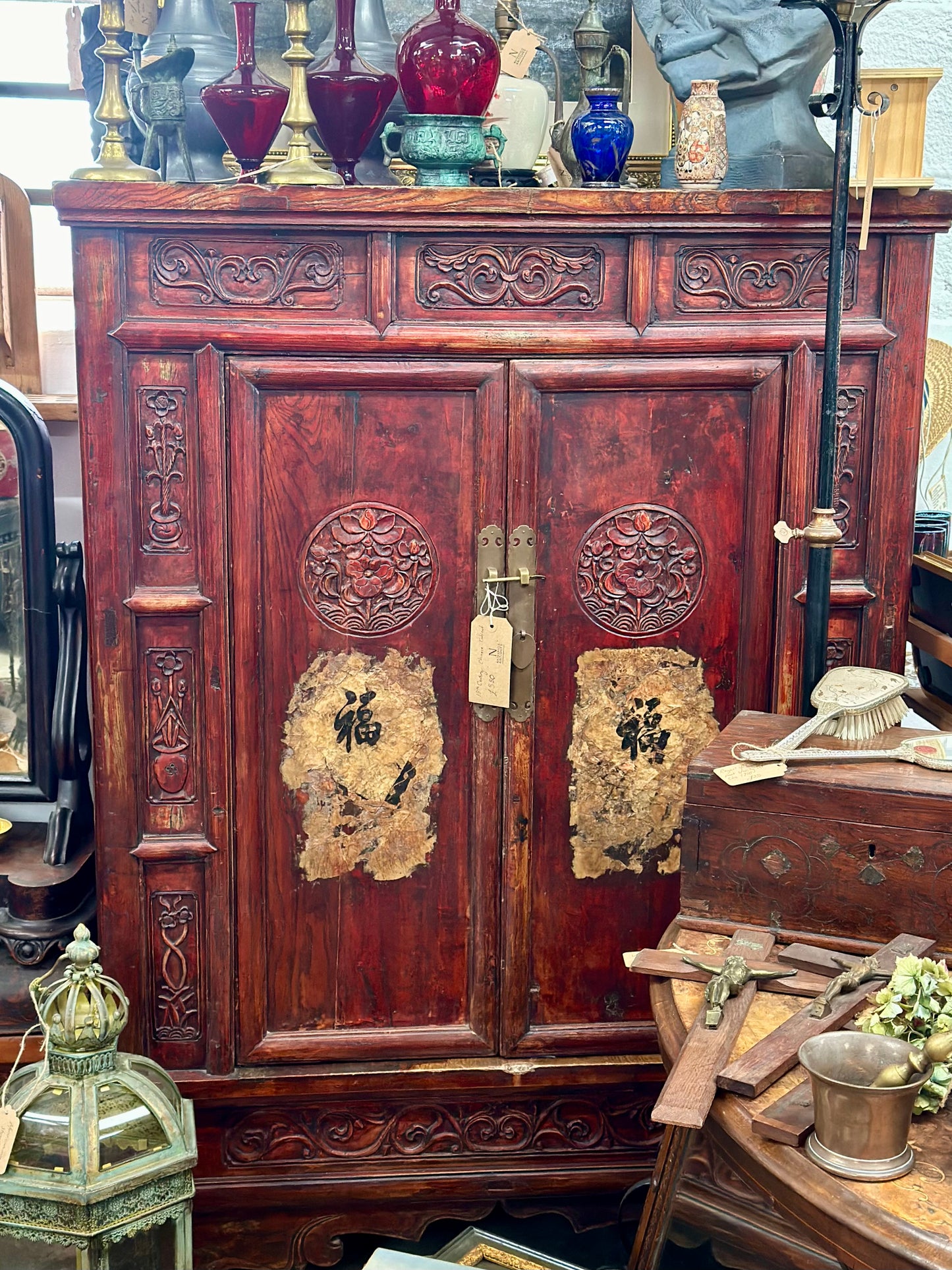 stunning antique Chinese marriage cabinet, late 19th century, with two drawers, a shelf, and a secret compartment