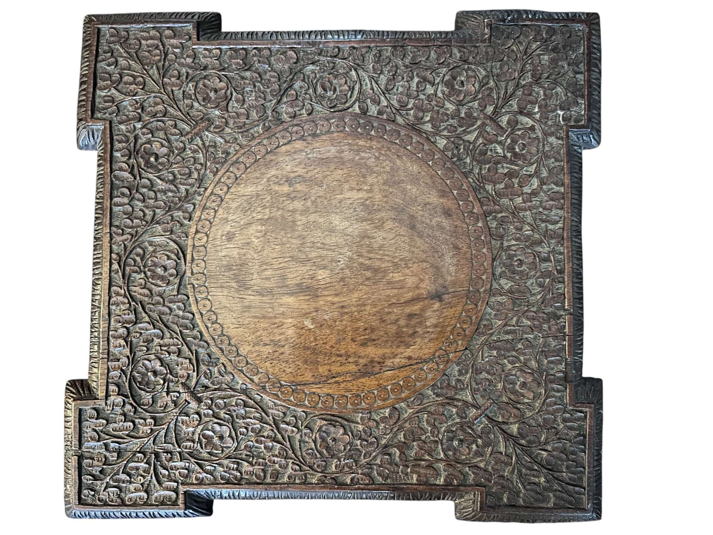 Anglo-Indian antique carved wooden table top with intricate floral designs, showcasing early 20th-century craftsmanship.